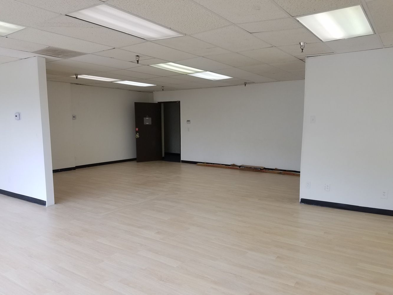 LARGE OPEN ROOM WITH NATURAL LIGHT. GREAT SPACE FOR WORK STATIONS.